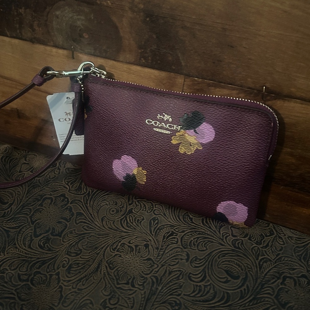 Coach plum multi Floral Wristlet NWT 6”X4”